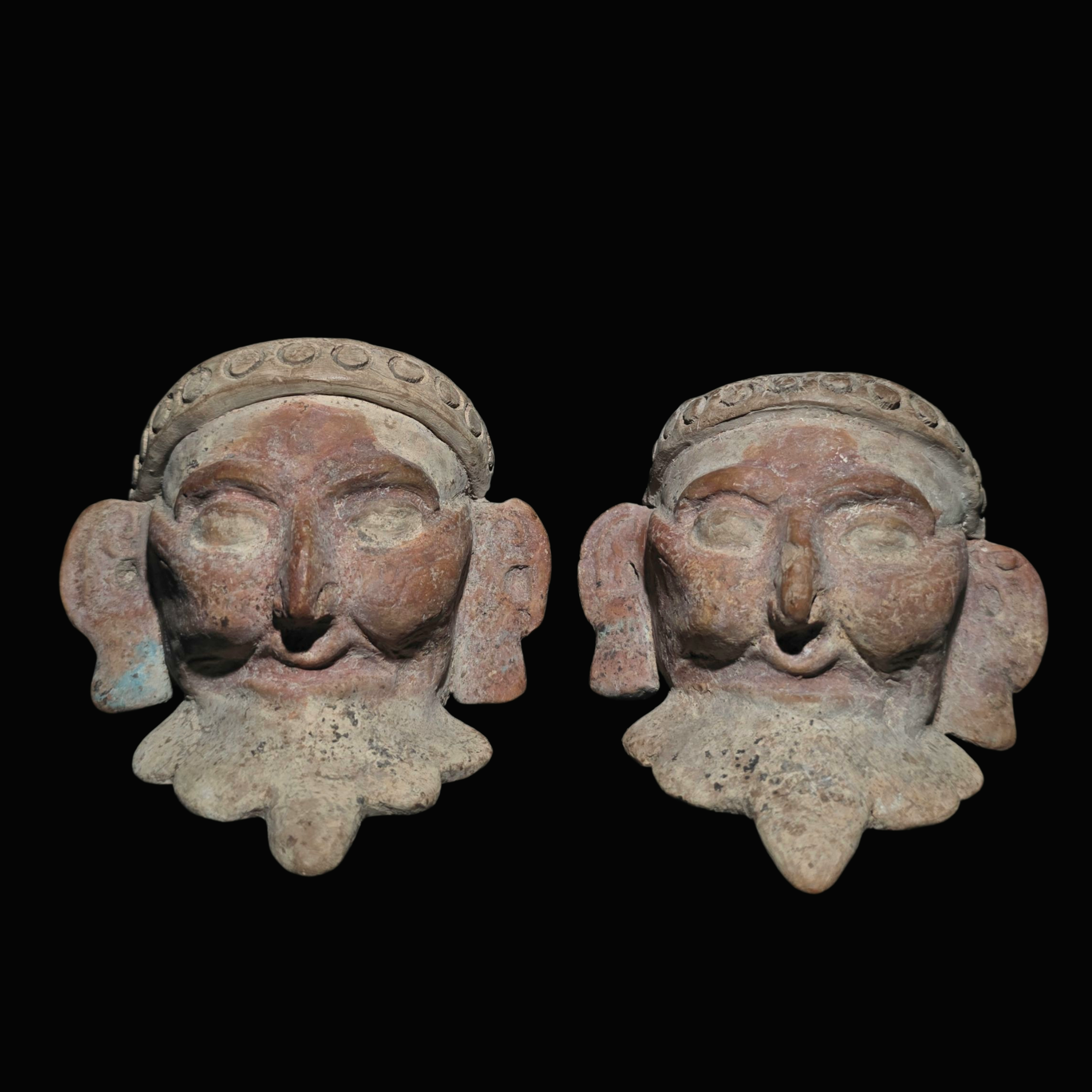 Pre-Columbian Pair of Veracruz Bearded Fire God Effigy Heads