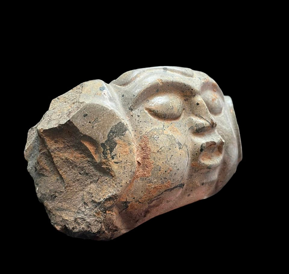 Fine Pre-Columbian Veracruz green stone Xipe Totec yoke fragment