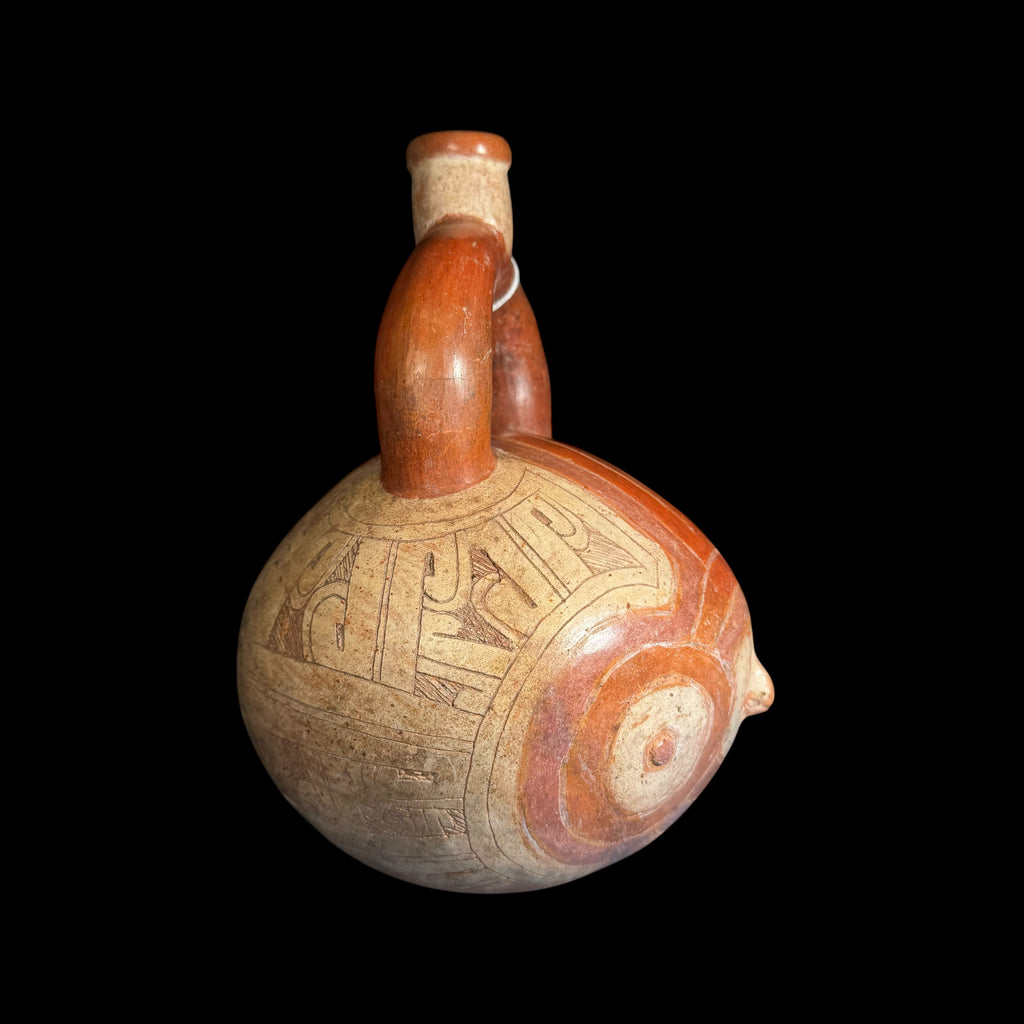 Pre-Columbian Chavin owl stirrup vessel